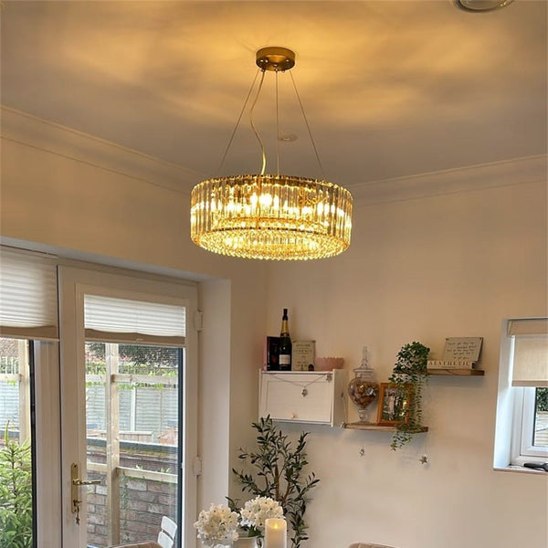 Round Crystal Chandelier Light with Adjustable Height and Elegant Metal Design 2